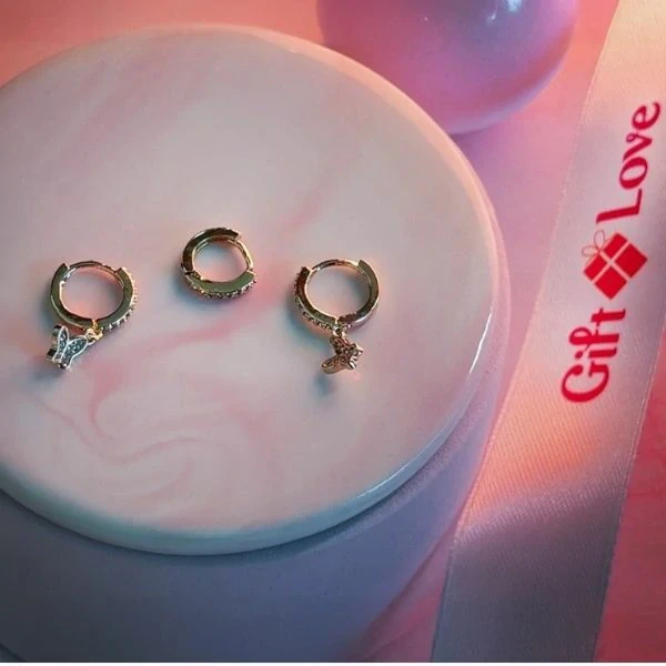 Three Small Yellow Gold Earrings with Dangling Butterflies Charms